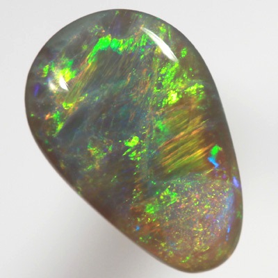 SOLID BLACK OPAL Crisp bright green in rolling flashes